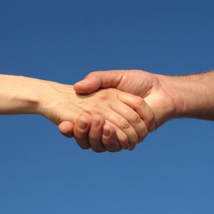 Shaking hands at the end of a successful interview